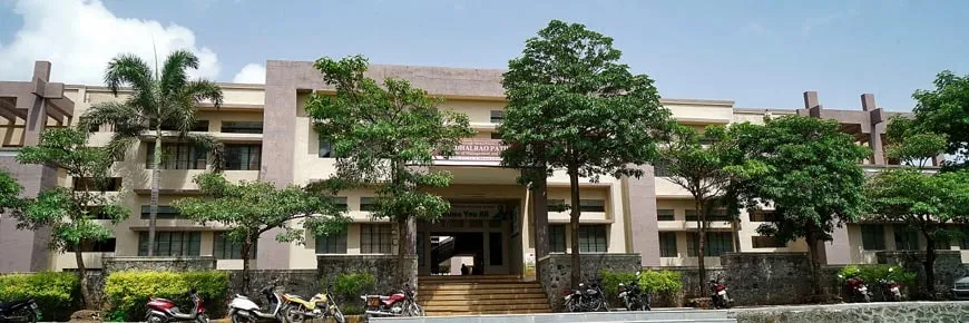 Deccan Maratha Junior College building among trees